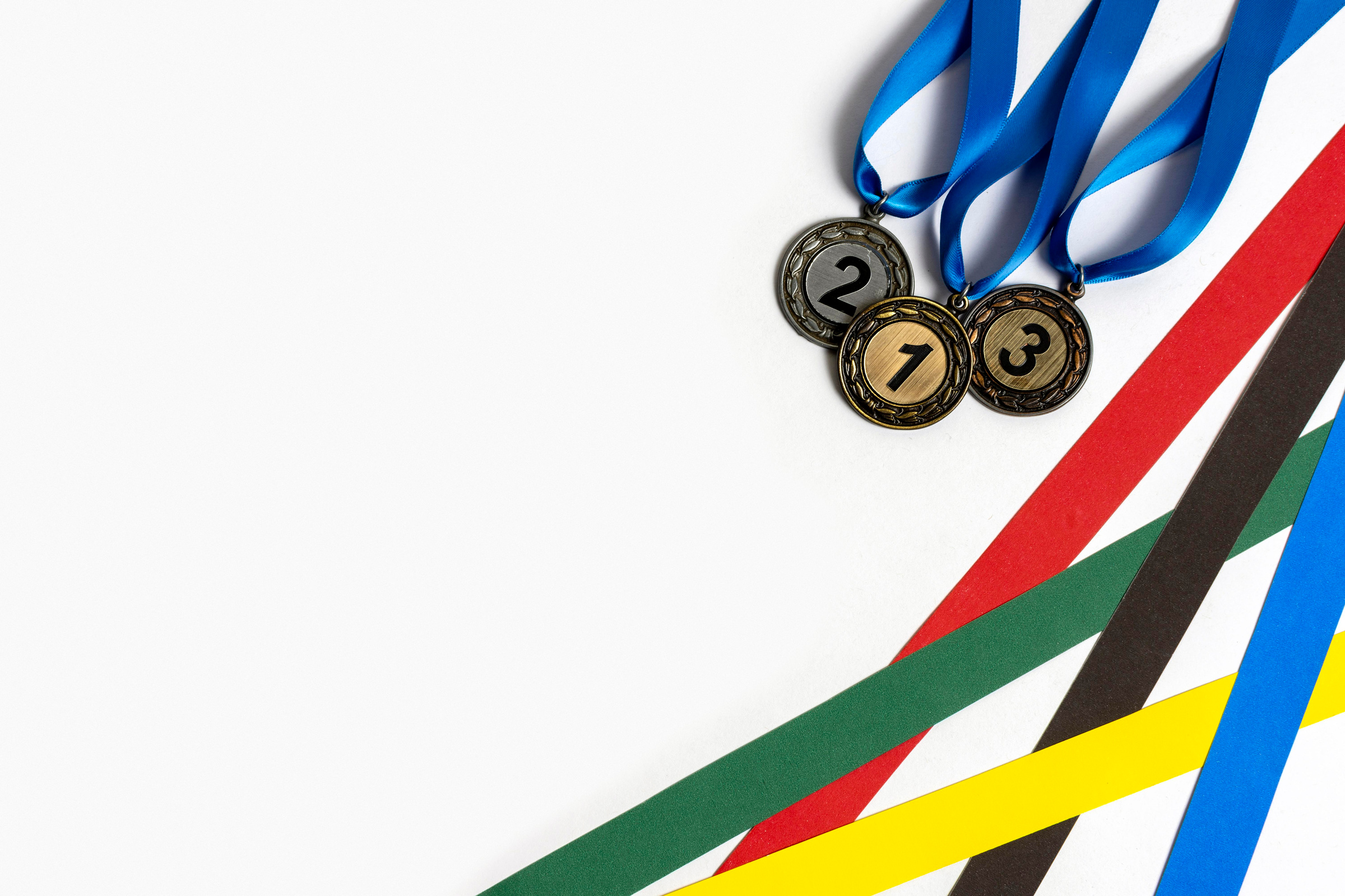 Olympics Medals and Ribbons on White Background